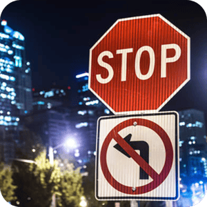 Stop Sign and No Left Turn Sign Stop Sign and No Left Turn Sign