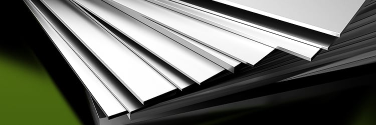 Pile of ACM panels with a wide variety of thicknesses, sizes and finishes.